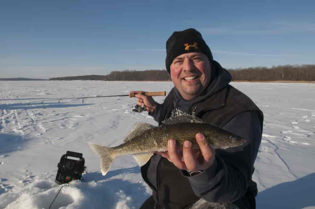 Ice fishing activities on Leeech Lake part of the ice fishing university event at Hiawatha Beach Resort.