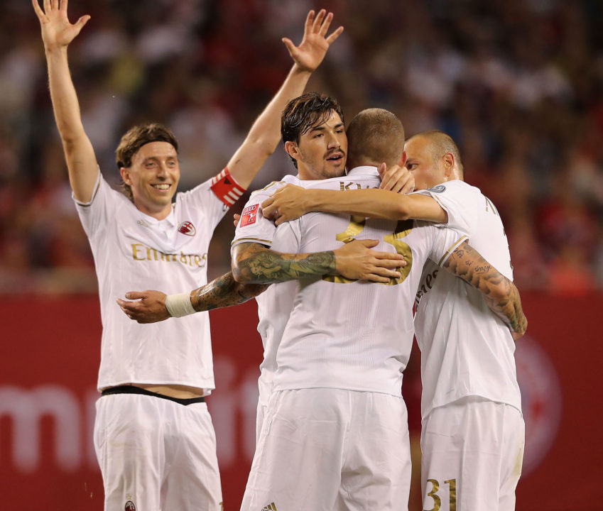 CHICAGO, IL - JULY 27: Andrea Bertollaci (2ndR) of Milan celebrates his goal together with teammates Riccardo Montolivo, Alessio Romagnoli and Luca Antonelli (L-R) during the International Champions Cup between FC Bayern Muenchen and AC Milan of AUDI Summer Tour USA 2016 at Soldier Field on July 27, 2016 in Chicago, Illinois. (Photo by Alexandra Beier/Bongarts/Getty Images)